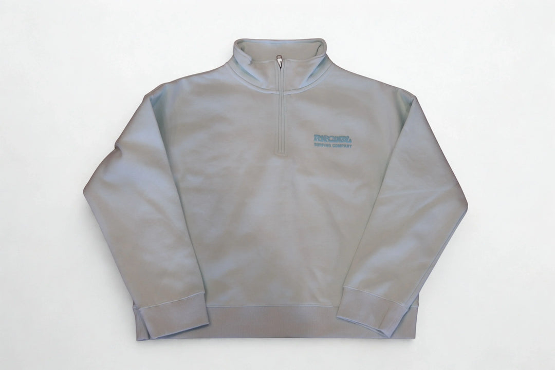 Light gray quarter-zip sweatshirt with subtle logo, ideal for casual or outdoor wear.