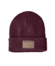 Maroon fleece beanie with patch detail, perfect for PNW outdoor adventures and coastal style.