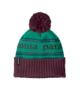 Teal and maroon beanie with pom-pom and striped pattern, perfect for PNW outdoor adventures.