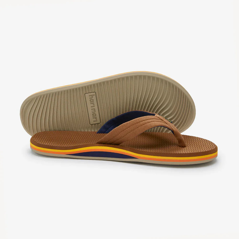 Brown flip flops with navy and orange stripes, ideal for beach days and coastal adventures.