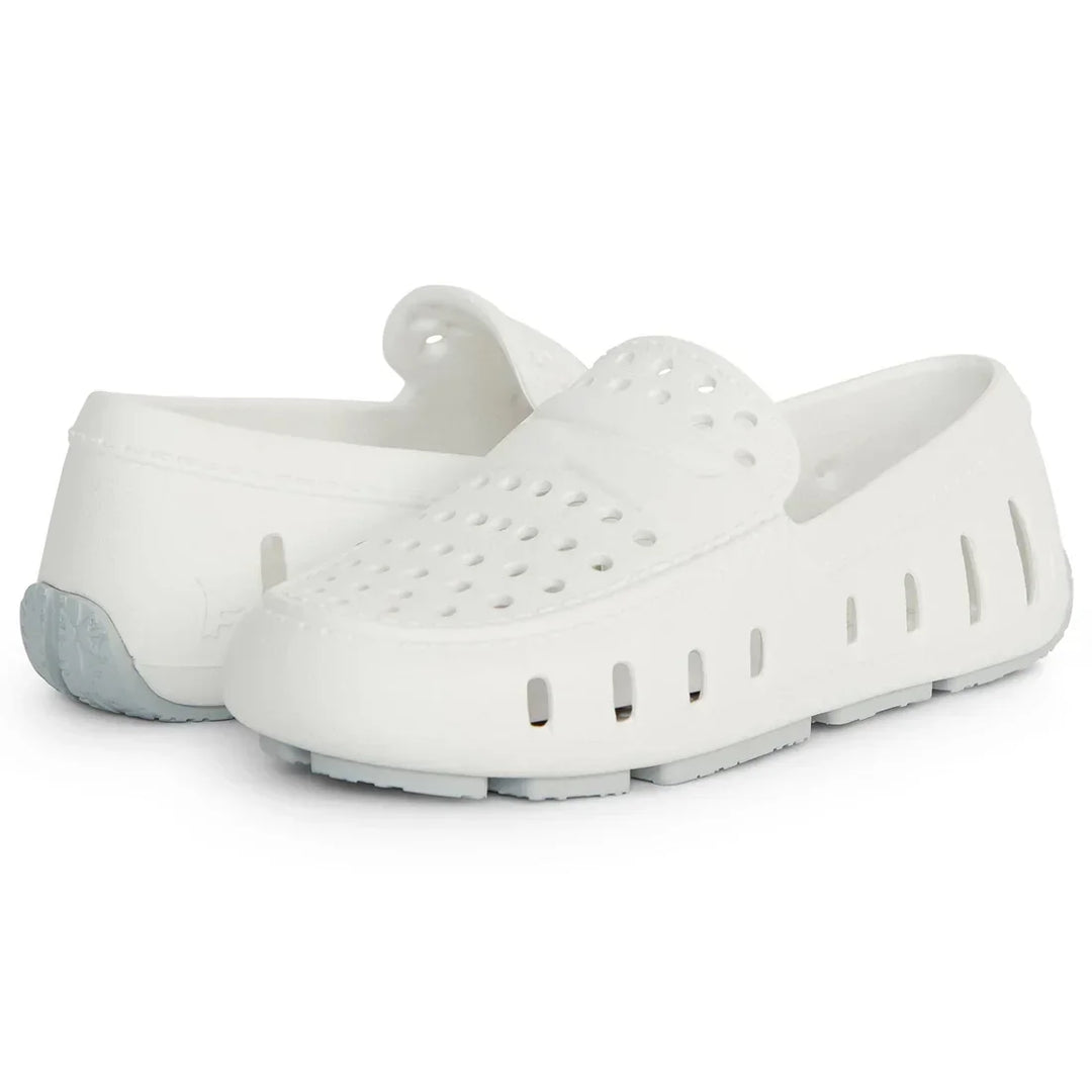 White perforated water shoes for kids, ideal for beach or pool activities