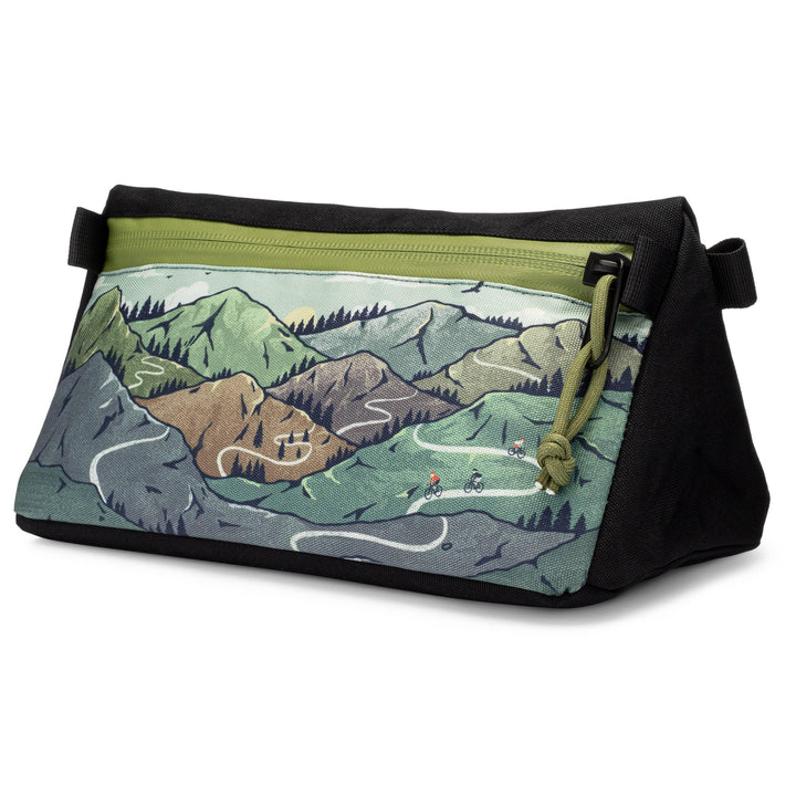 Oso Supply Co waterproof bike handlebar storage bag with a mountain landscape illustration