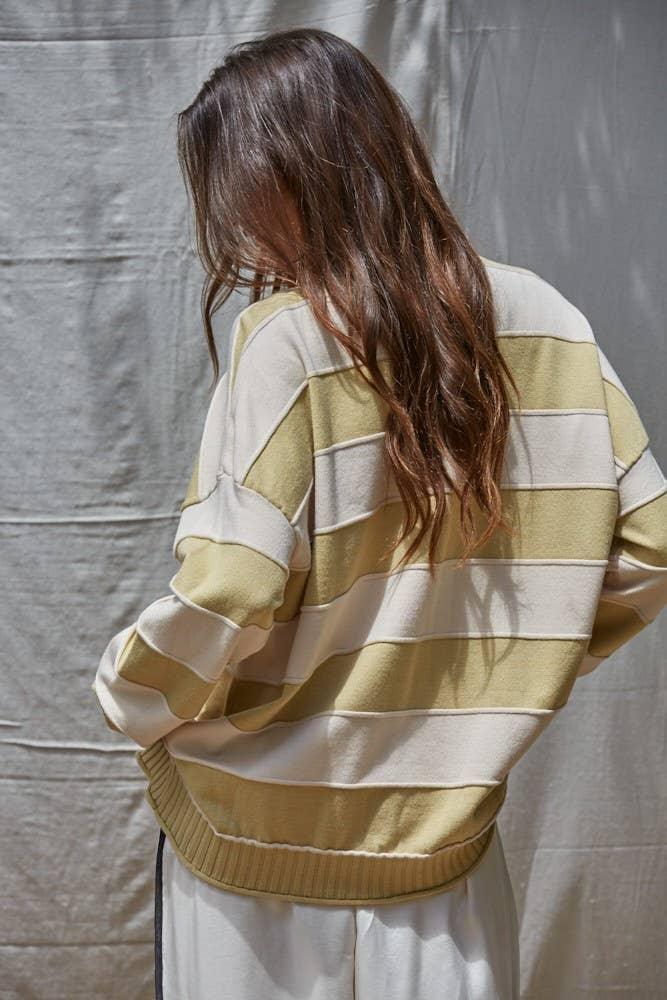 Striped olive and cream sweater for coastal PNW style, perfect for beach days and bike rides