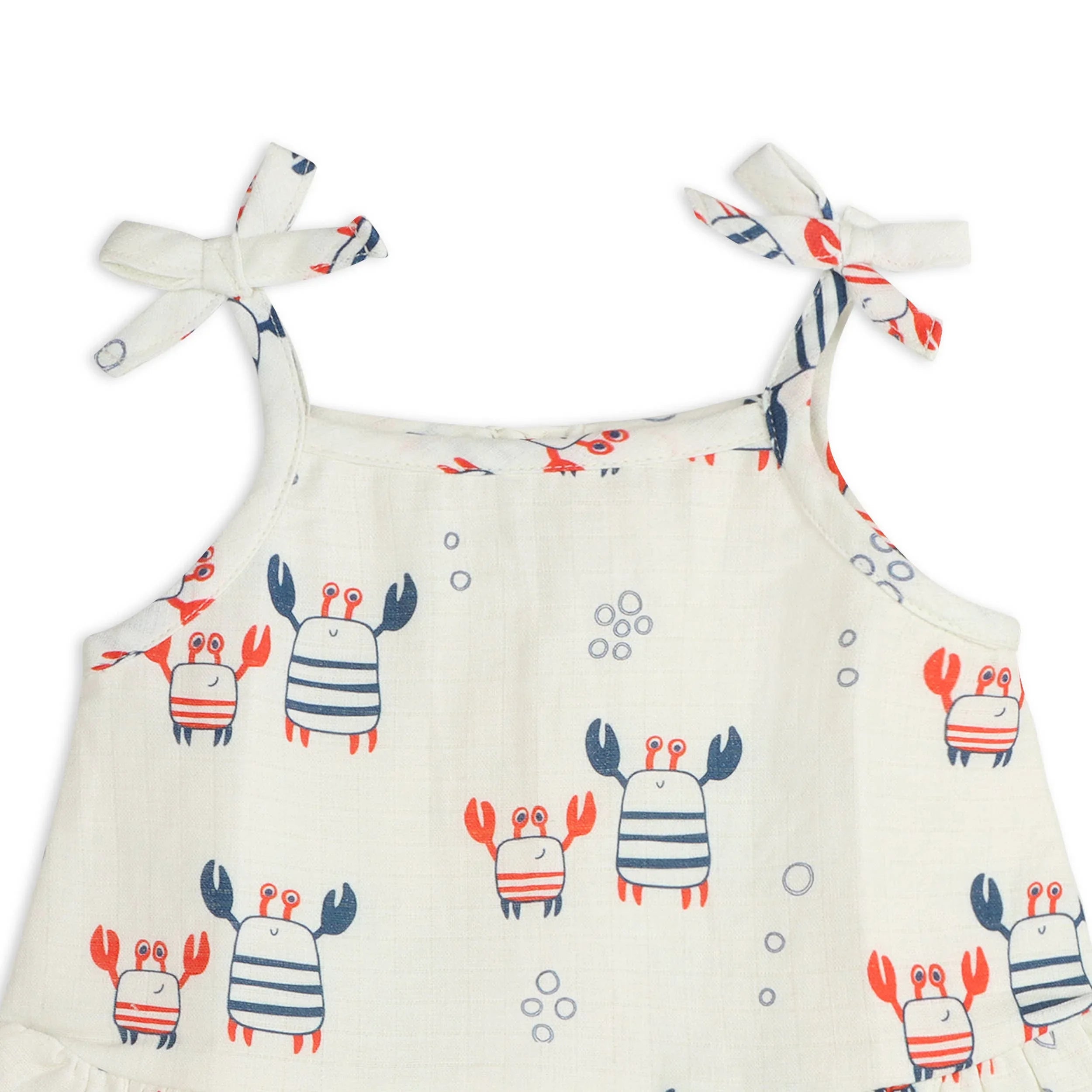 Baby girl's crab print sundress with tie straps, nautical theme, red and blue crabs on cream background