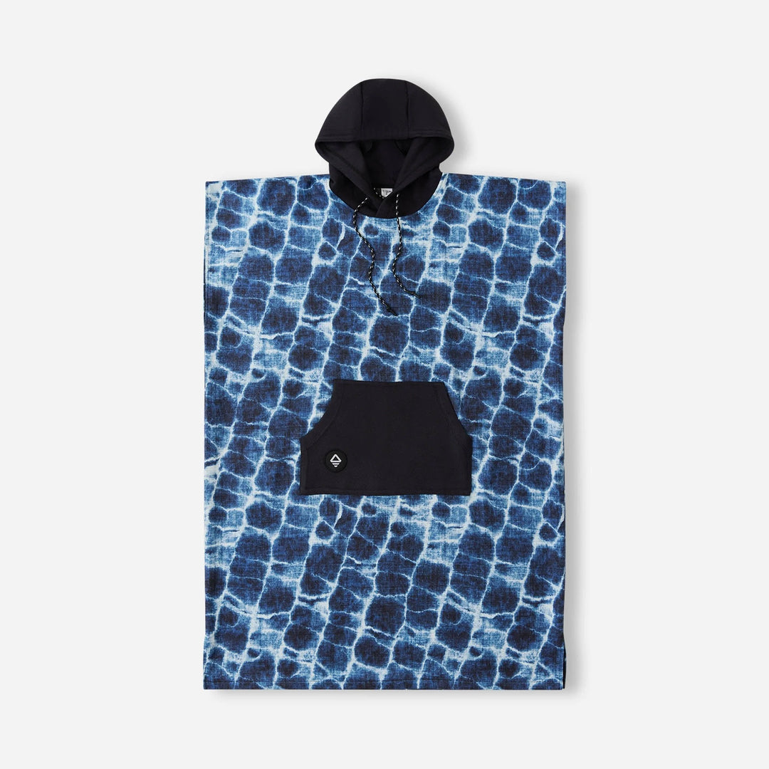 Blue tie-dye hooded poncho with black pocket, perfect for beach days and coastal adventures.