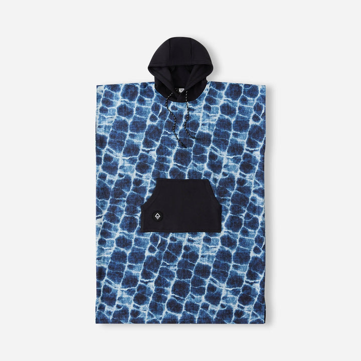 Blue tie-dye hooded poncho with black pocket, perfect for beach days and coastal adventures.