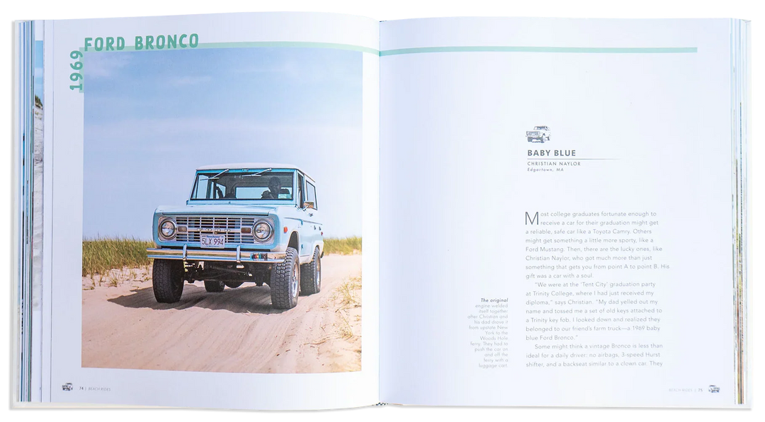 1969 Ford Bronco in baby blue on sandy beach, vintage off-road adventure vehicle