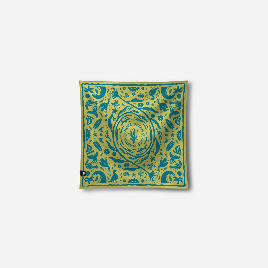 Yellow bandana with blue ocean life print, 'More Ocean Less Plastic' slogan, coastal adventure gear