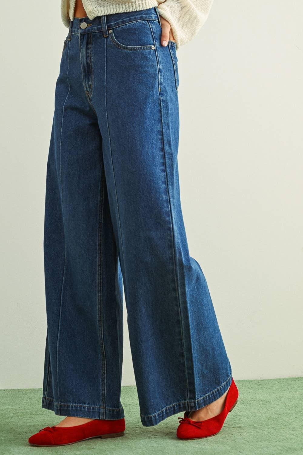 Wide-leg high-rise denim jeans with red flats, styled for casual comfort