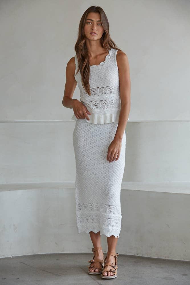 White crochet midi dress with ruffle hem, perfect for coastal style and beach days