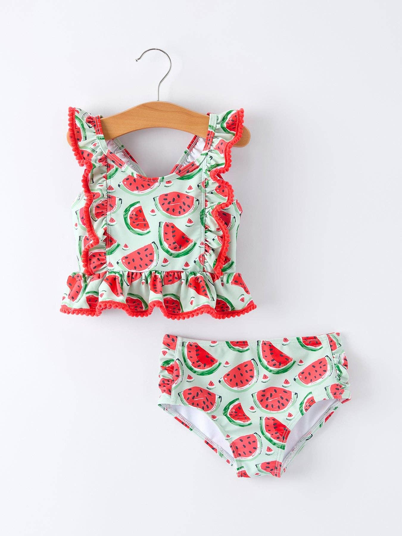 Watermelon print toddler swimsuit with ruffles, perfect for beach days and summer adventures.