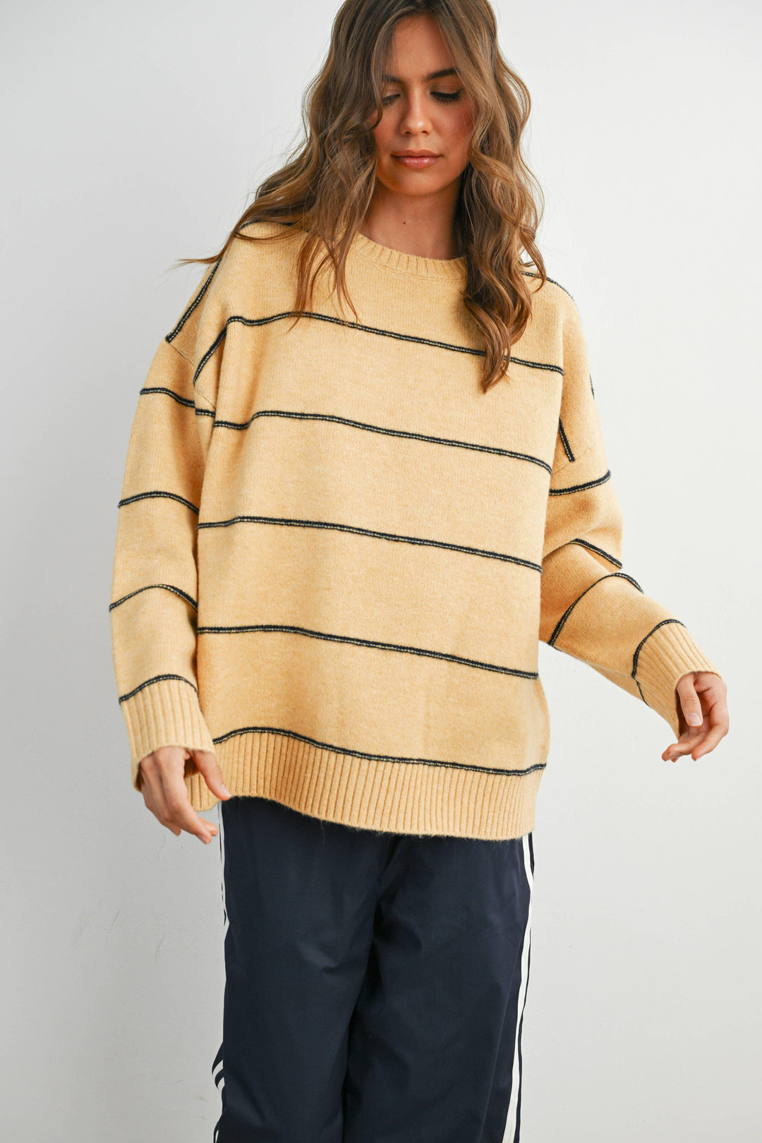 Yellow striped knit sweater with black lines, cozy casual wear for PNW adventures
