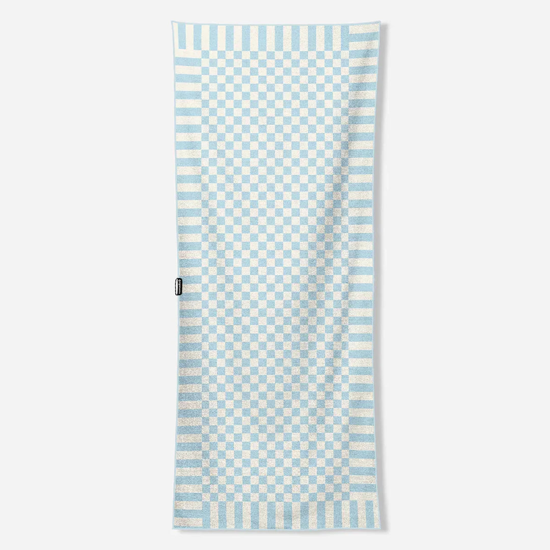 Light blue and white checkered beach towel for coastal adventures and outdoor lifestyle