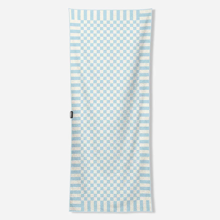 Light blue and white checkered beach towel for coastal adventures and outdoor lifestyle