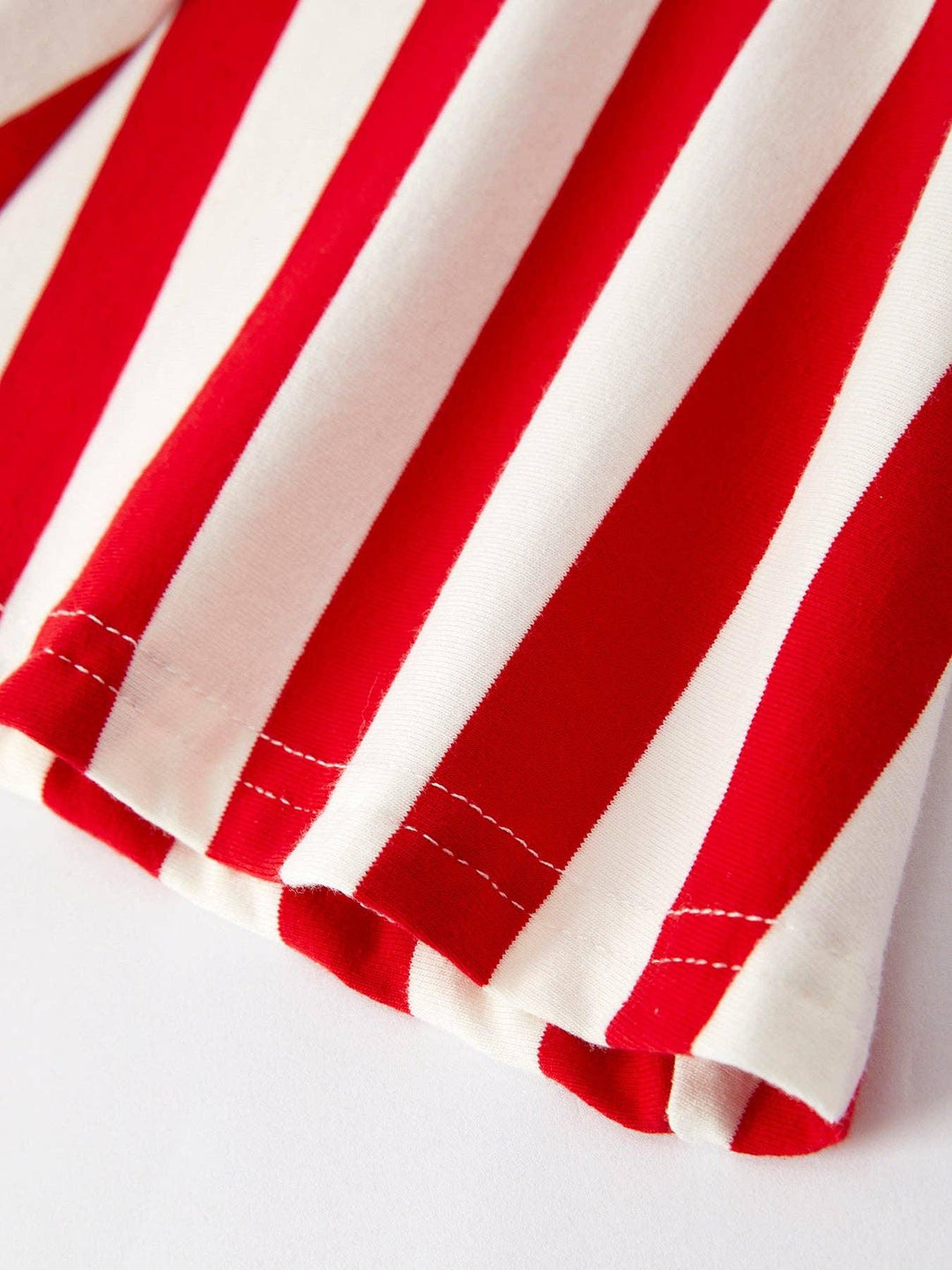 Red and white striped coastal style tee with clean stitching detail