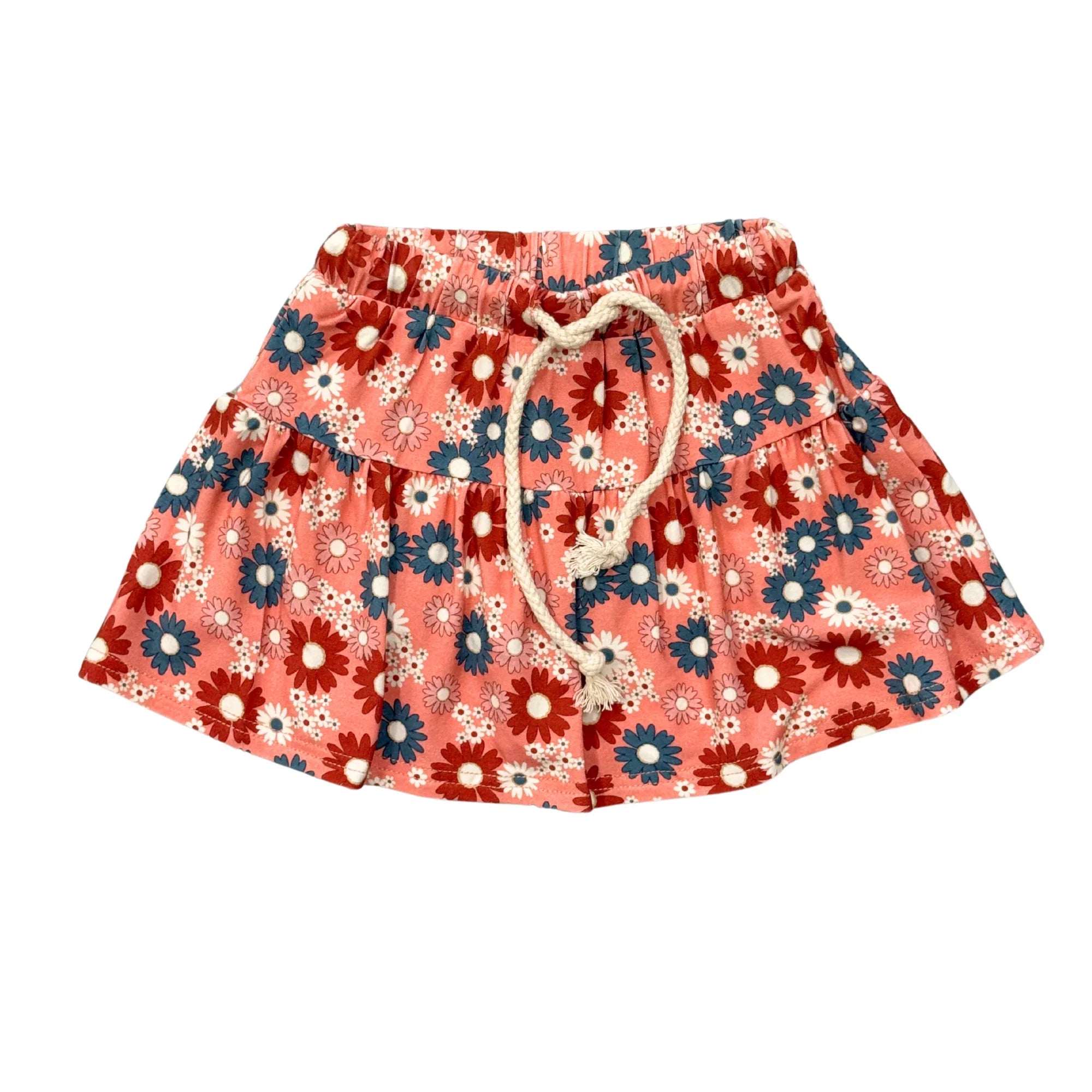 Pink floral skirt with red and blue daisies, drawstring waist, perfect for beach days and coastal adventures