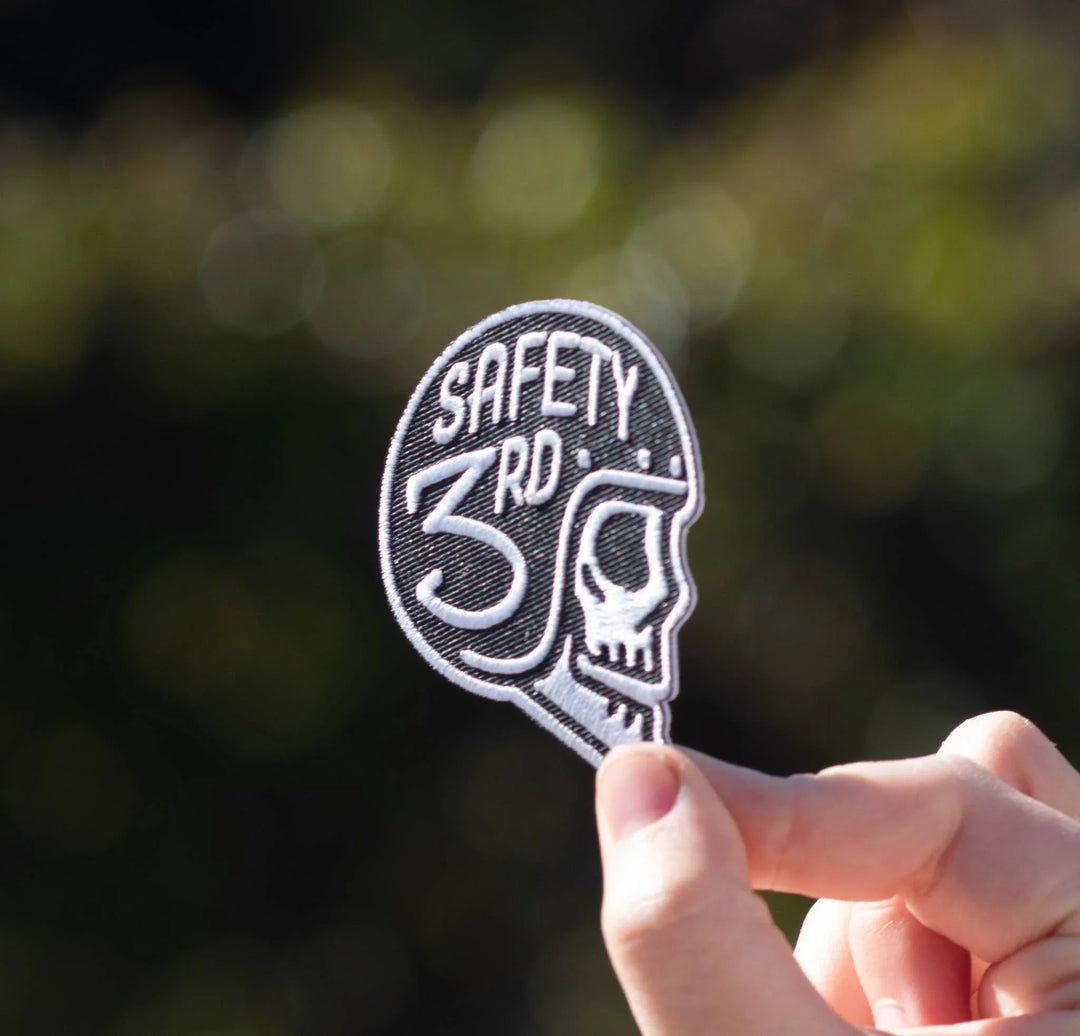 Embroidered patch with skull design and &