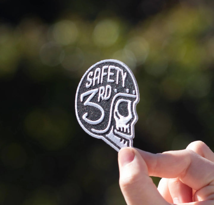 Embroidered patch with skull design and &