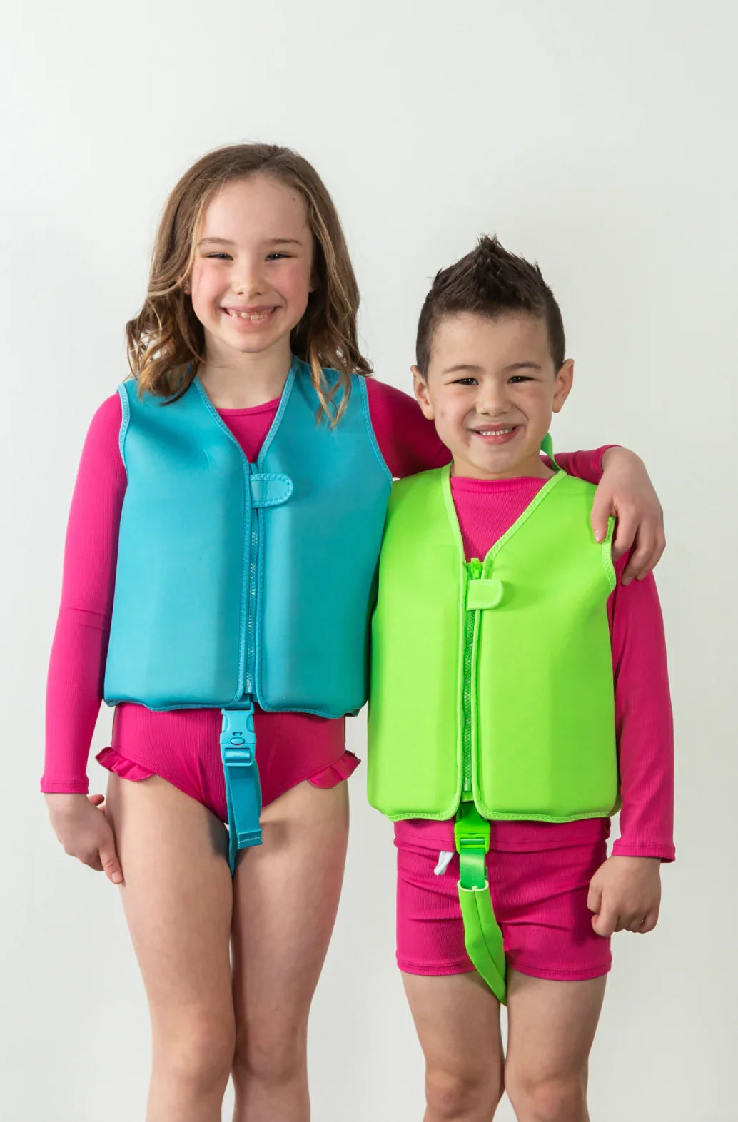 Kids in colorful swim vests for water safety and fun