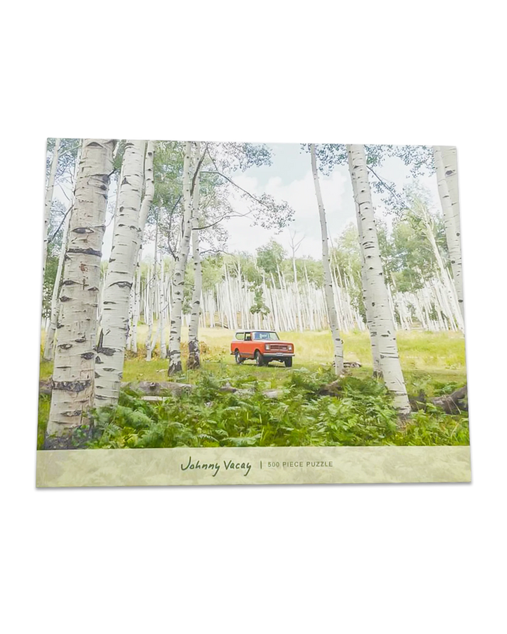 Johnny Vacay 500-piece puzzle featuring vintage truck in aspen forest, outdoor adventure theme