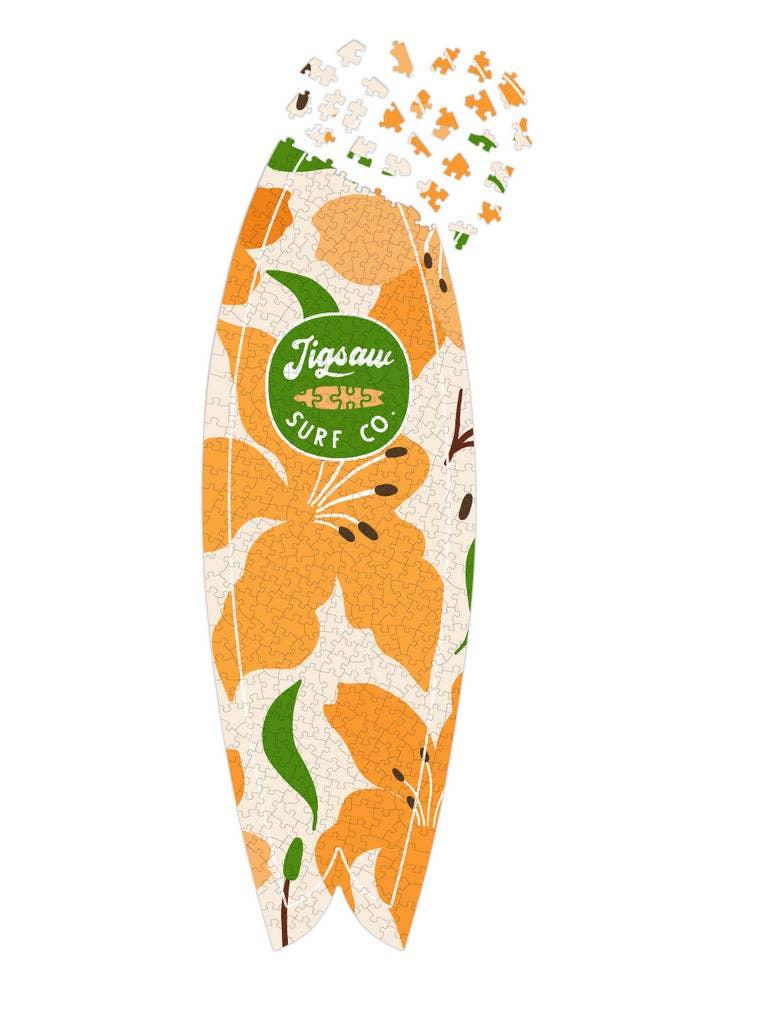 Jigsaw Surf Co puzzle with orange floral surfboard design