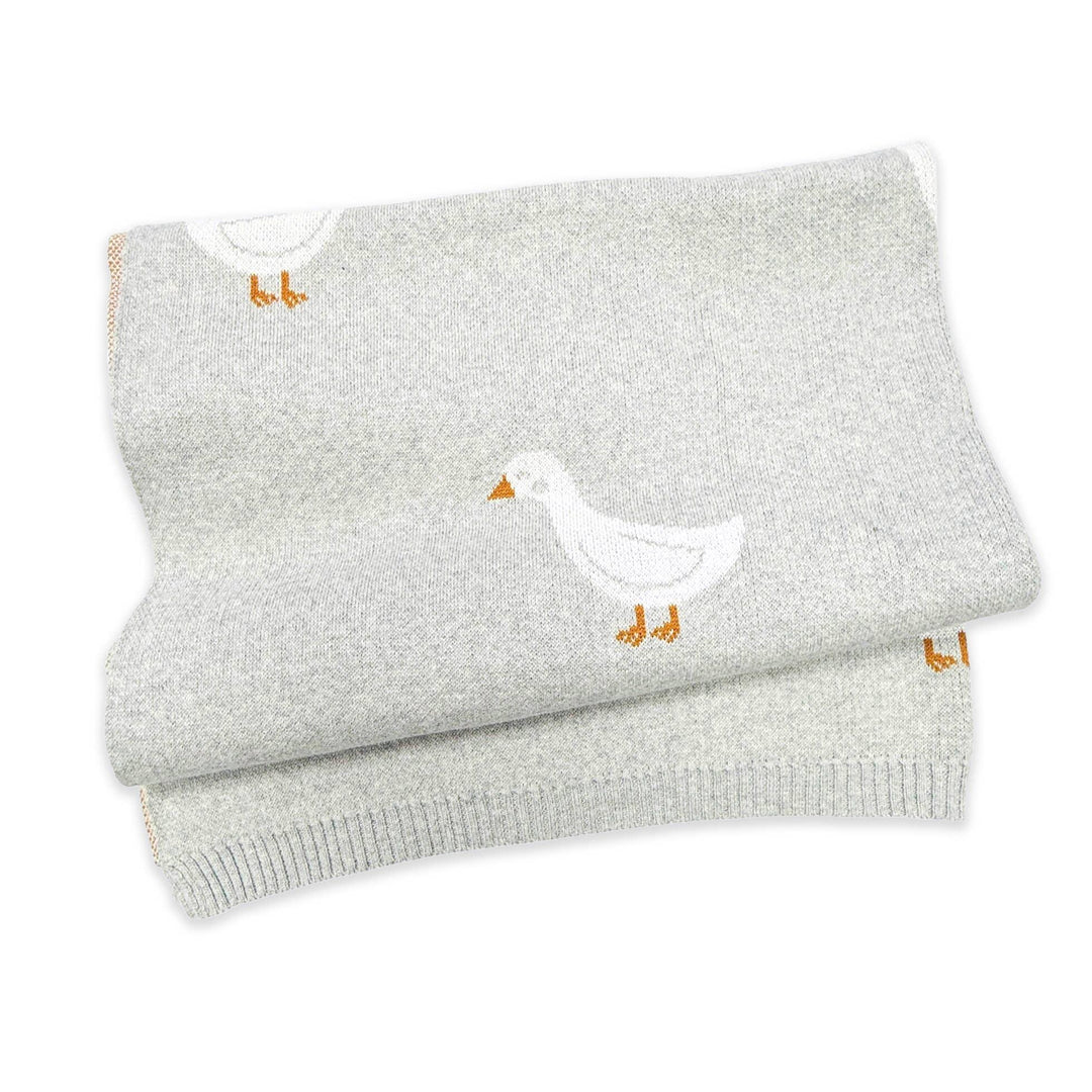 Soft gray knit baby blanket with white duck and orange beak design, cozy nursery essential