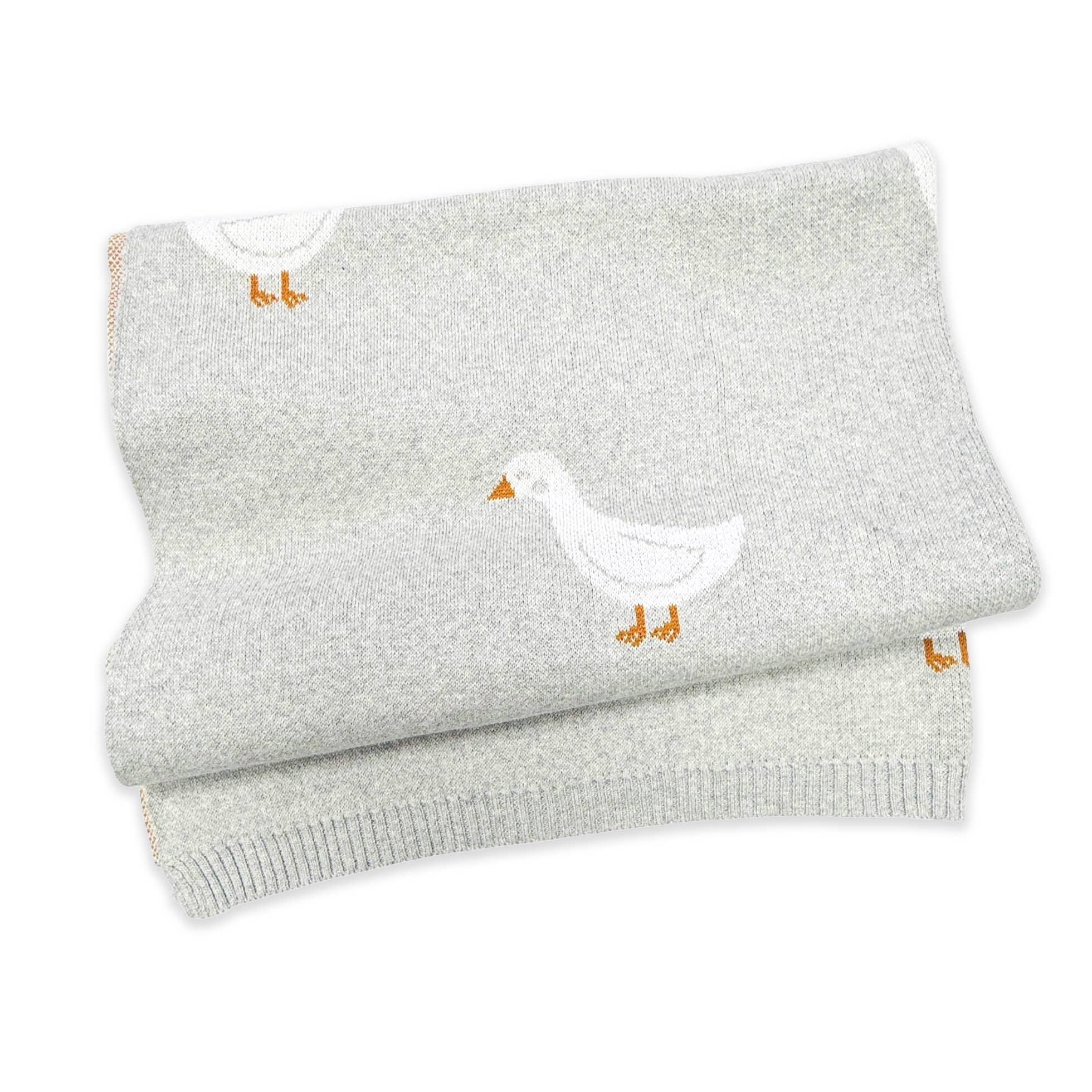 Soft gray knit baby blanket with white duck and orange beak design, cozy nursery essential