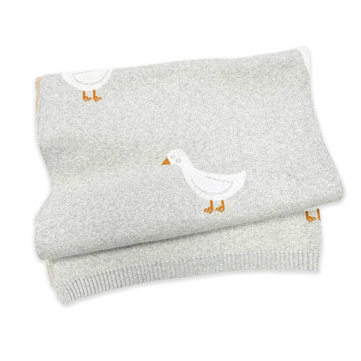 Soft gray knit baby blanket with white duck and orange beak design, cozy nursery essential