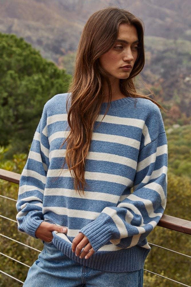 Blue and white striped cozy sweater for coastal outdoor adventures