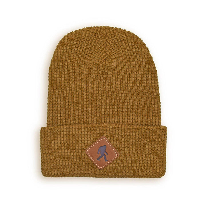 Brown waffle knit beanie with Sasquatch patch, cozy outdoor gear for PNW adventures