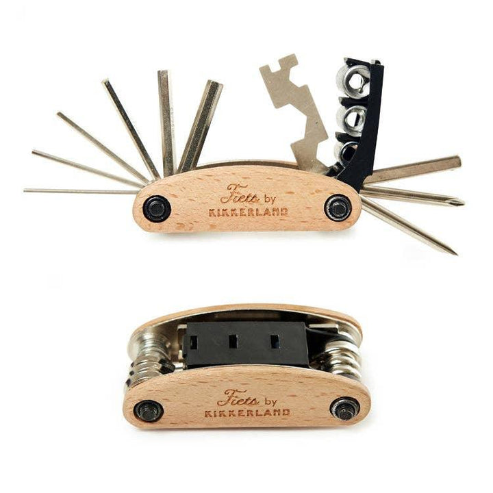Compact wooden multi-tool with bike repair tools, ideal for outdoor adventures and trail rides