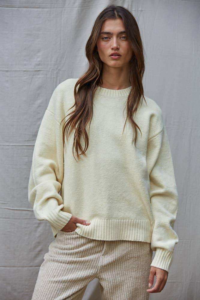 Cream oversized knit sweater with ribbed hem, coastal style loungewear for PNW weekends