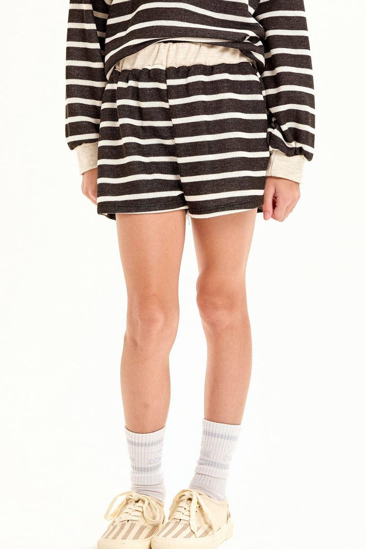 Striped lounge shorts with matching top, cozy socks, and casual sneakers for PNW coastal style