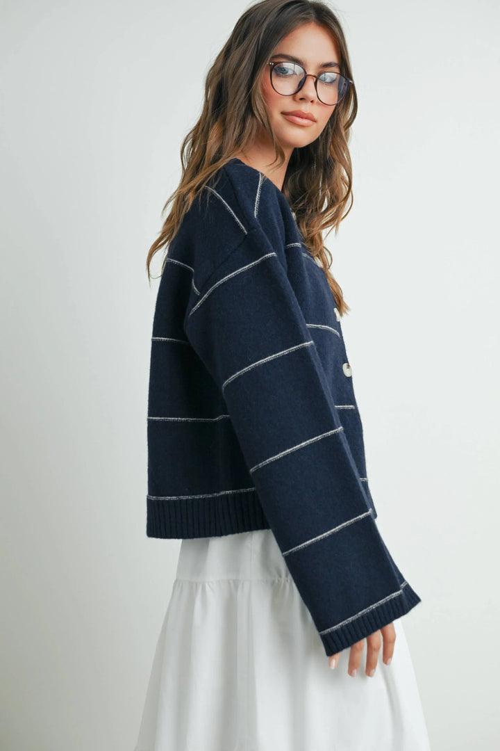 Navy blue striped cardigan with white trim, cozy knit sweater for coastal style and everyday wear