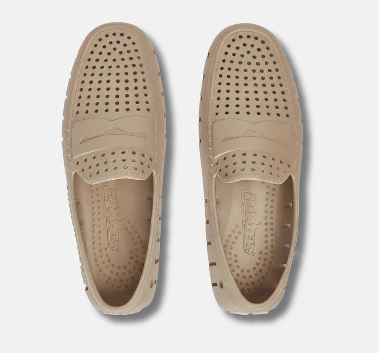 Tan perforated water shoes for beach and outdoor adventures, lightweight and breathable design