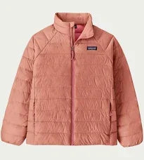 Pink quilted puffer jacket for outdoor adventures, perfect for PNW coastal style and trail days.