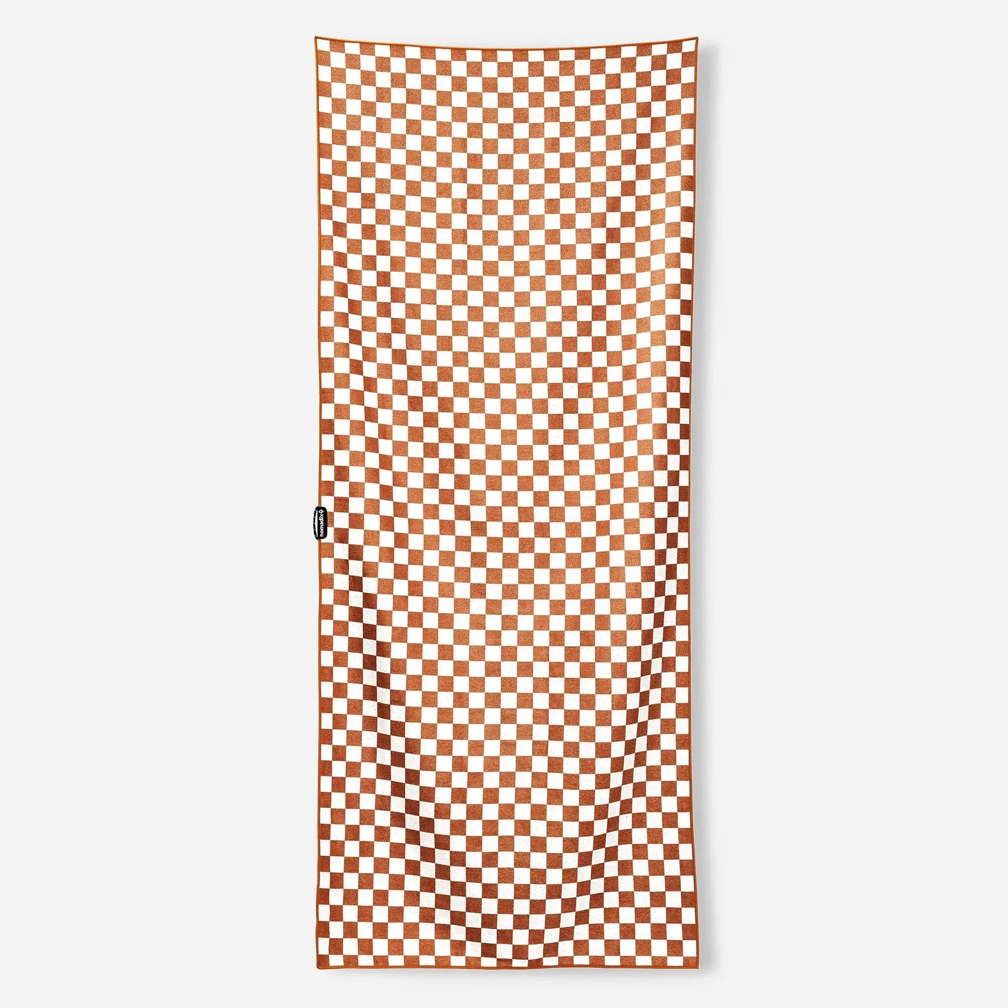 Orange and white checkered beach towel, perfect for outdoor adventures and picnics.