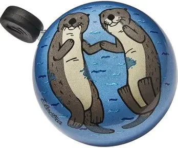 Otter-themed bike bell with playful sea otters on blue water background, perfect for coastal adventures.