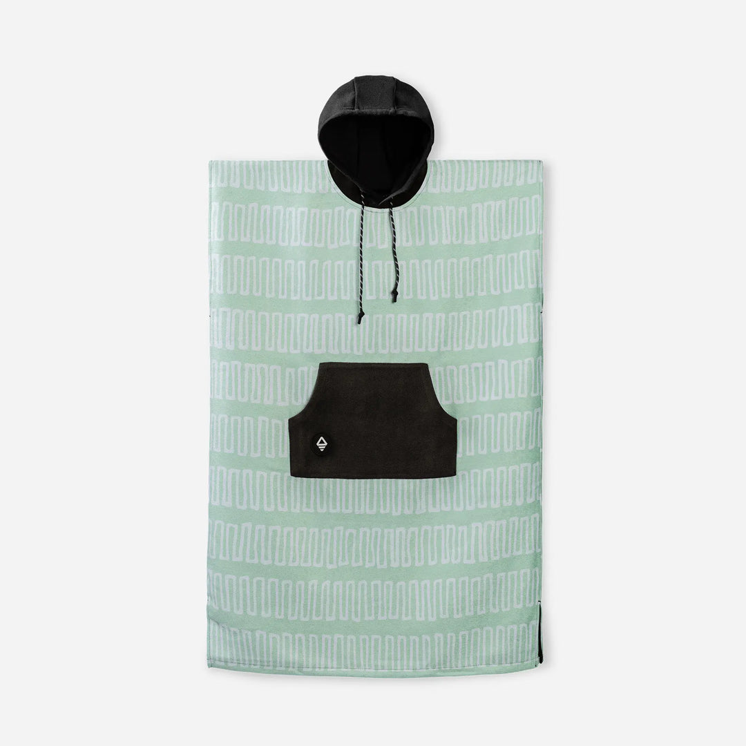 Mint green hooded poncho towel with white geometric pattern and black front pocket for beach or outdoor adventures